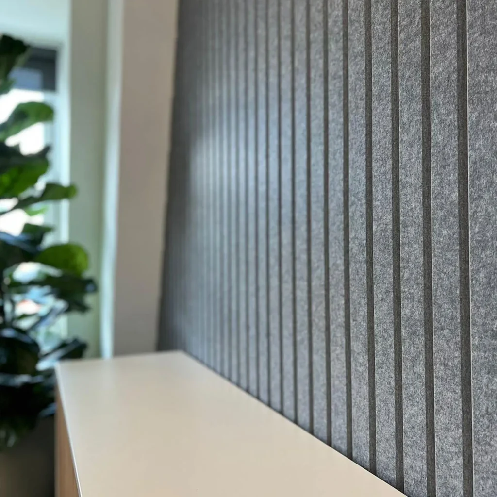 CNC engraved polyester acoustic wall panels with custom geometric patterns